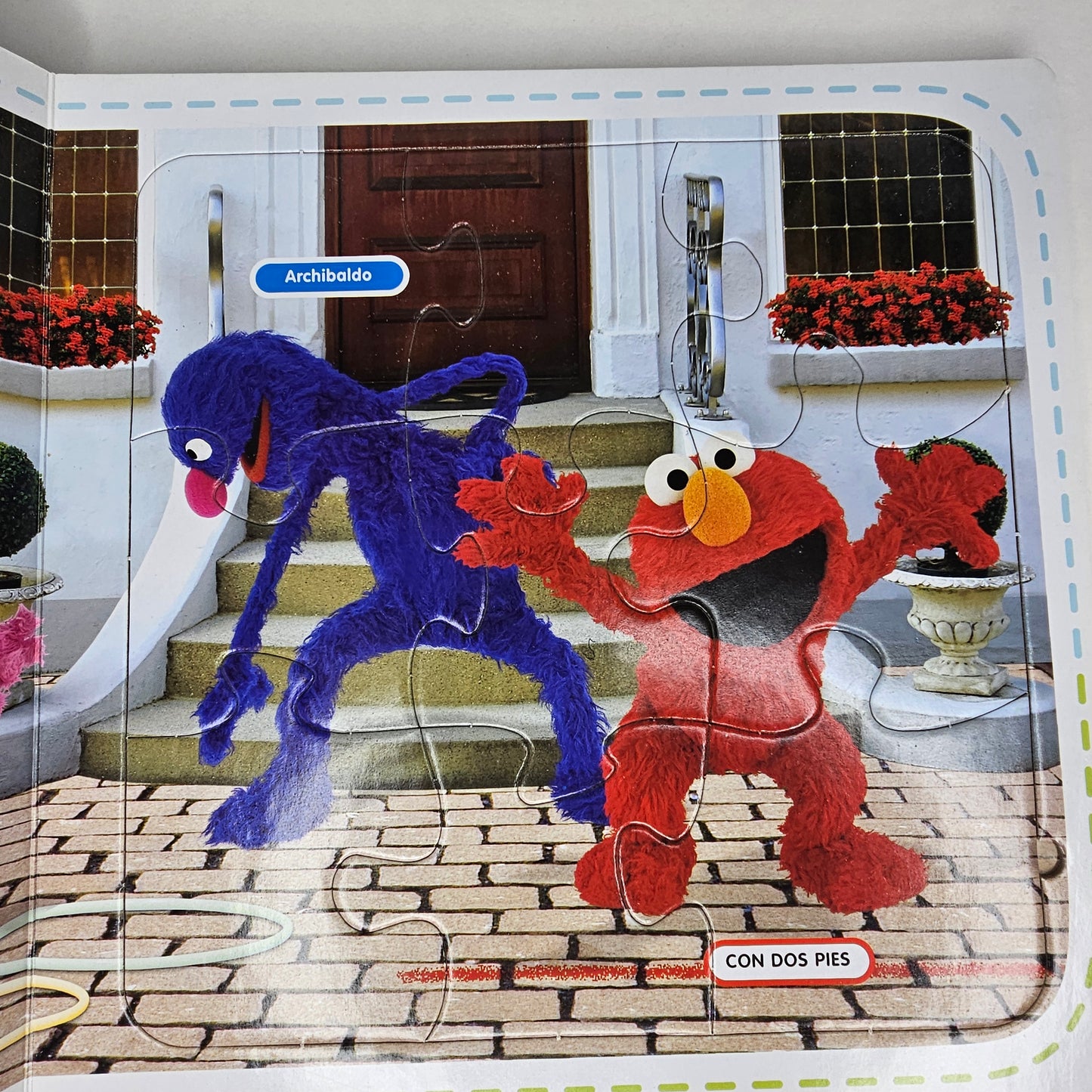 Sesame Street Los Oficios de Elmo Spanish Puzzle Book